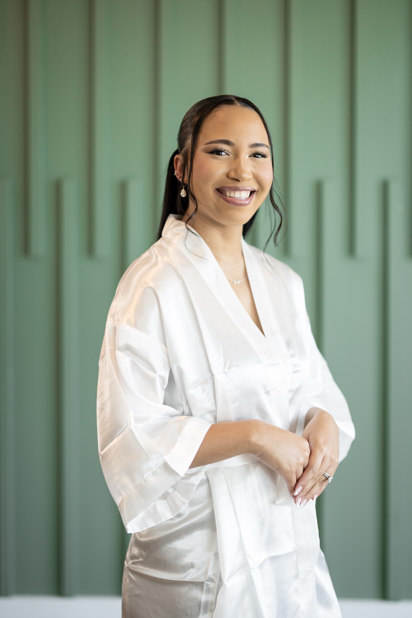 Rachel holding Kevin's face during their first look at The Colony House