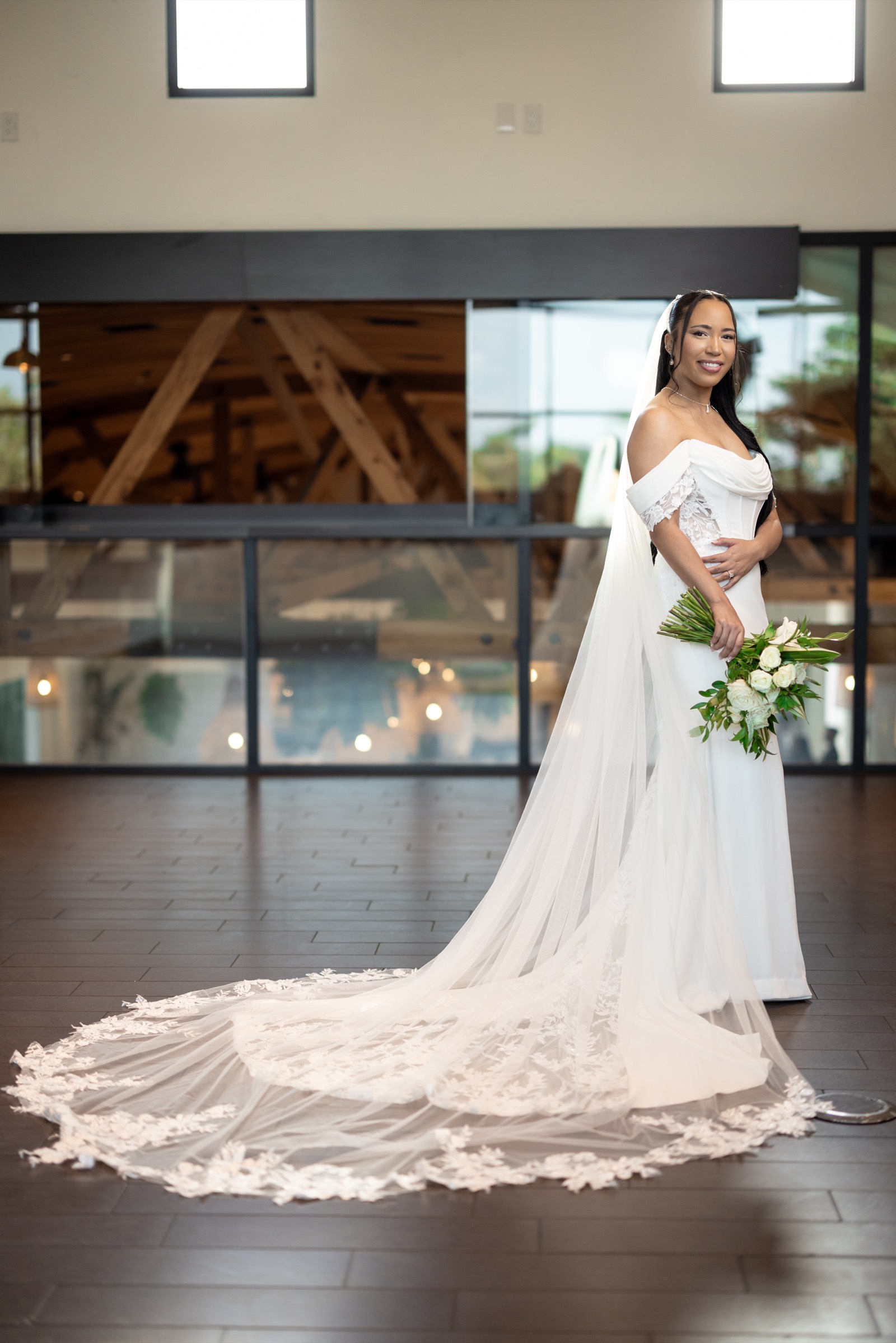 Kevin and Rachel's first kiss at their Colony House wedding ceremony in front of the living green wall in Anaheim, California