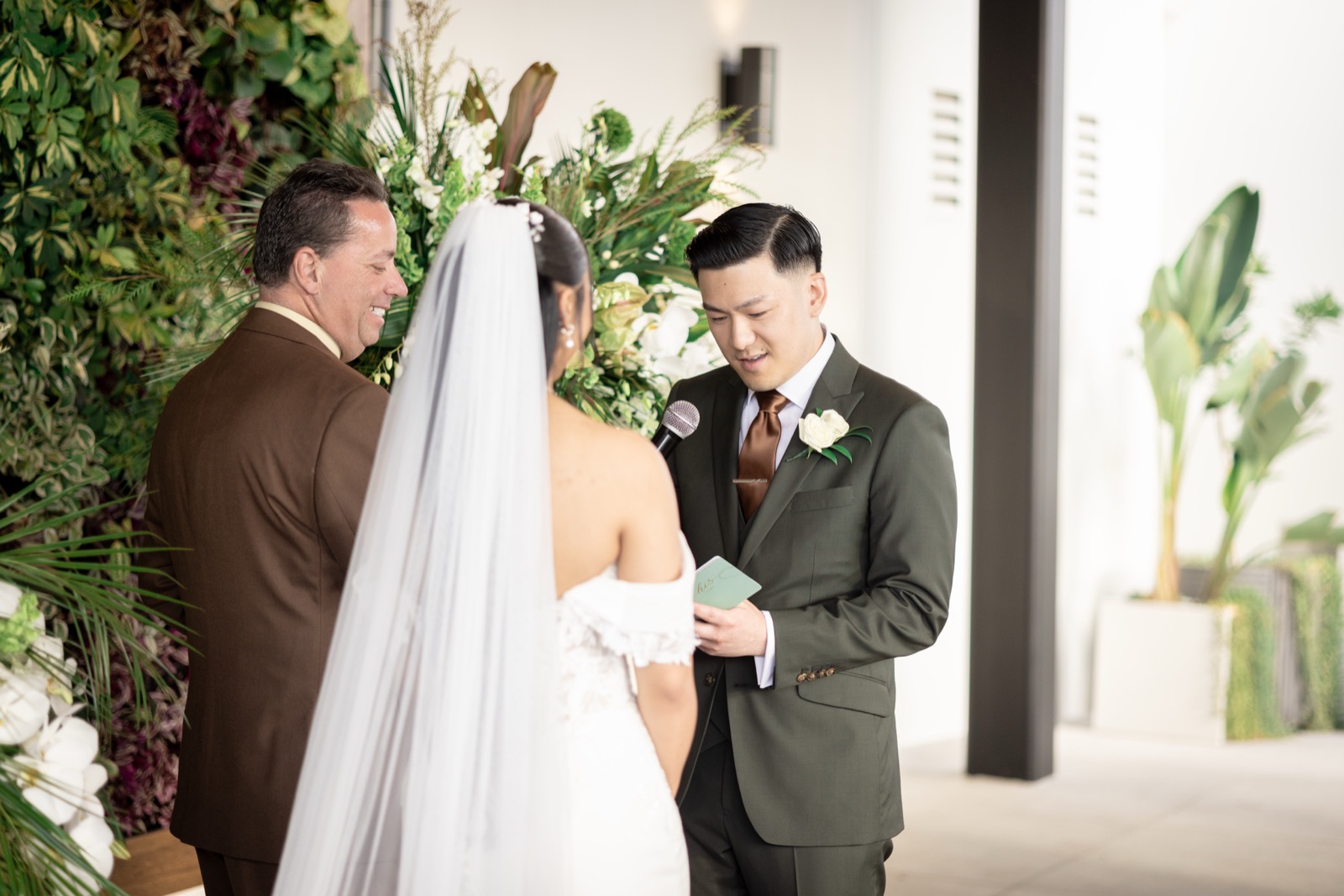 Kevin and Rachel with friends group portrait at The Colony House sweetheart table
