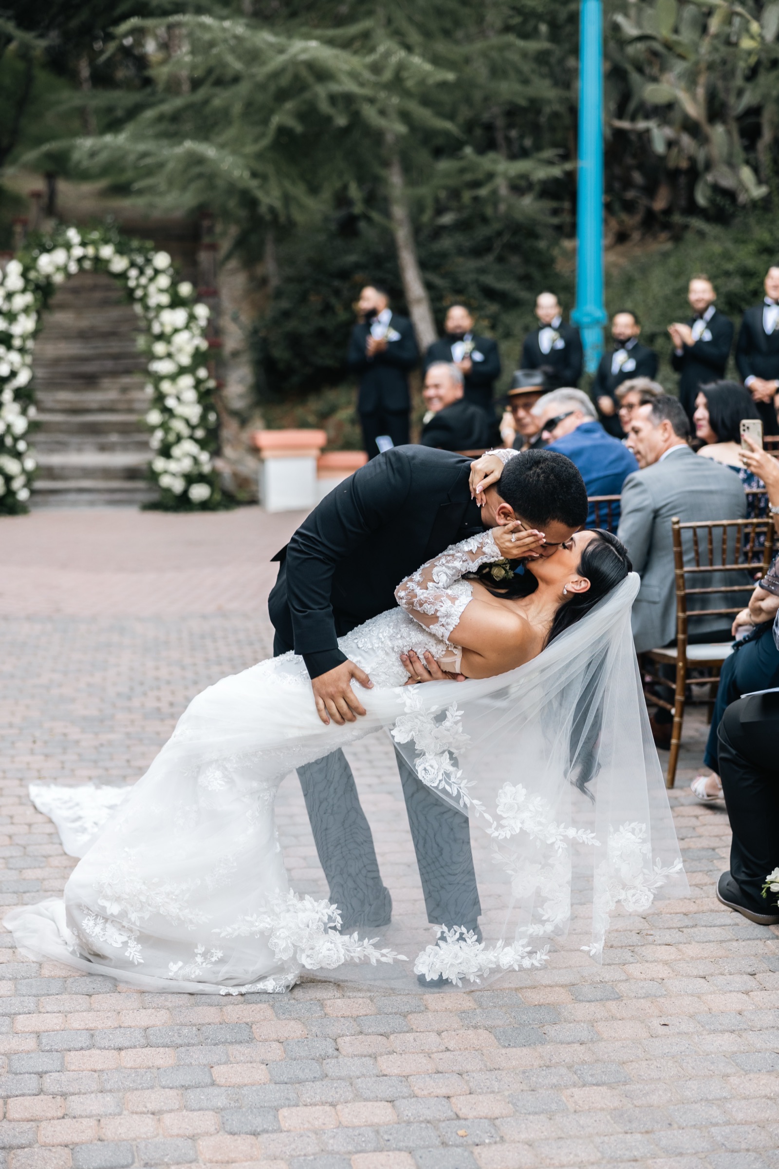 Mikey dipping Michelle for a kiss after ceremony at Rancho Las Lomas