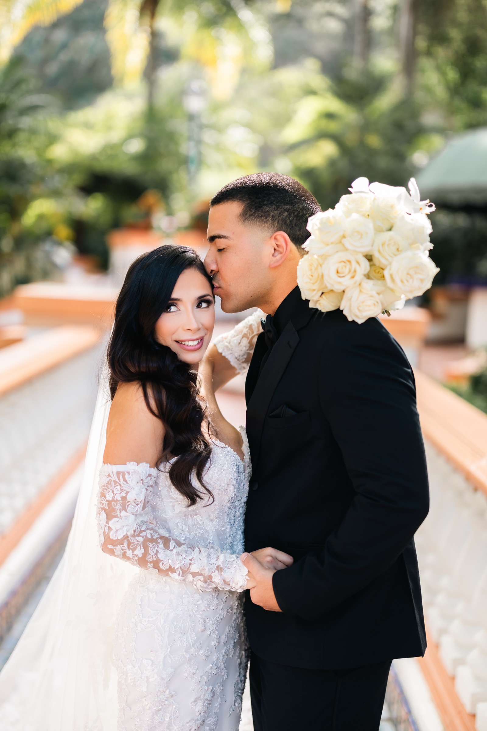 Mikey and Michelle couple portrait on the staircase at Rancho Las Lomas