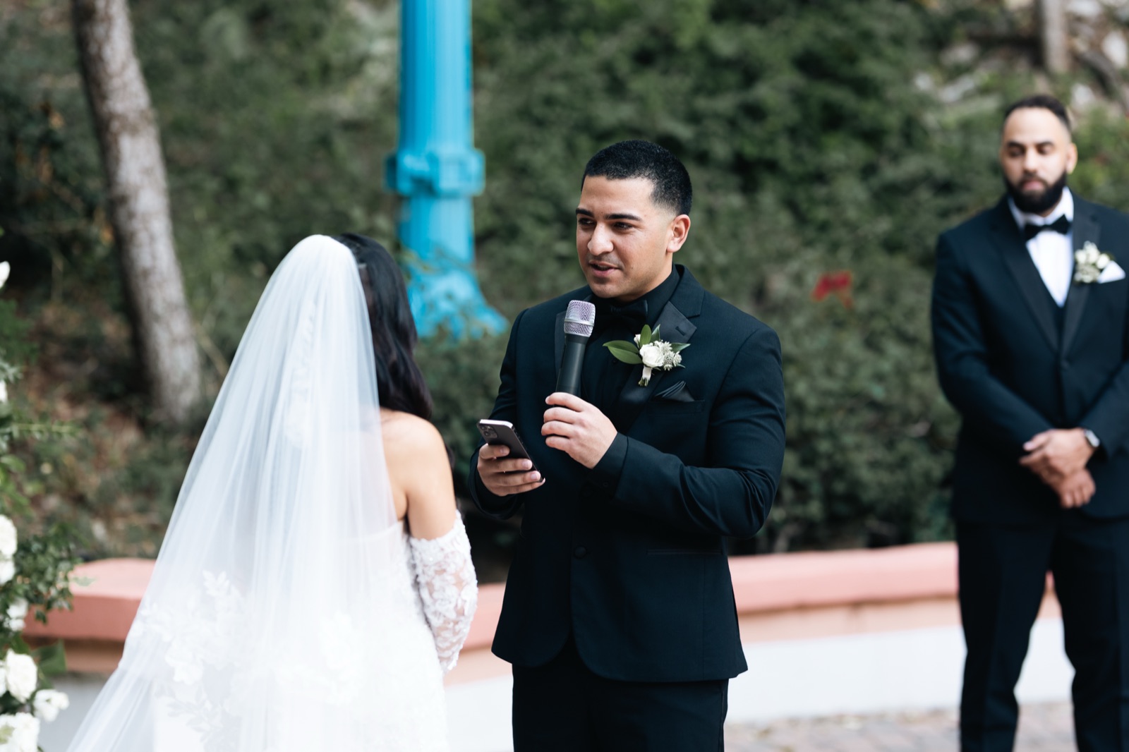 Mikey reading his vows to Michelle during Rancho Las Lomas ceremony