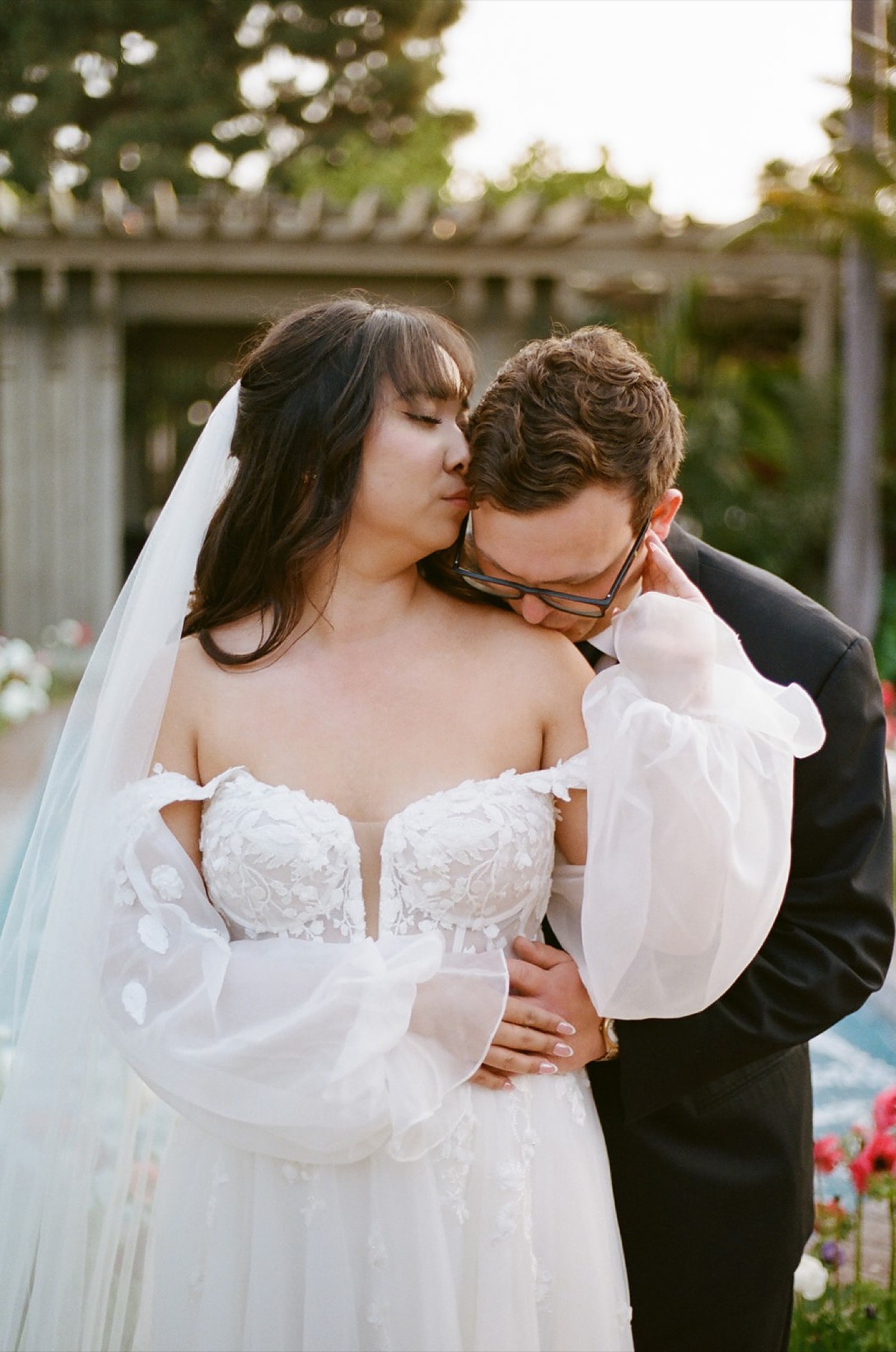 Golden hour film portrait of Janet and Ryan at their garden wedding