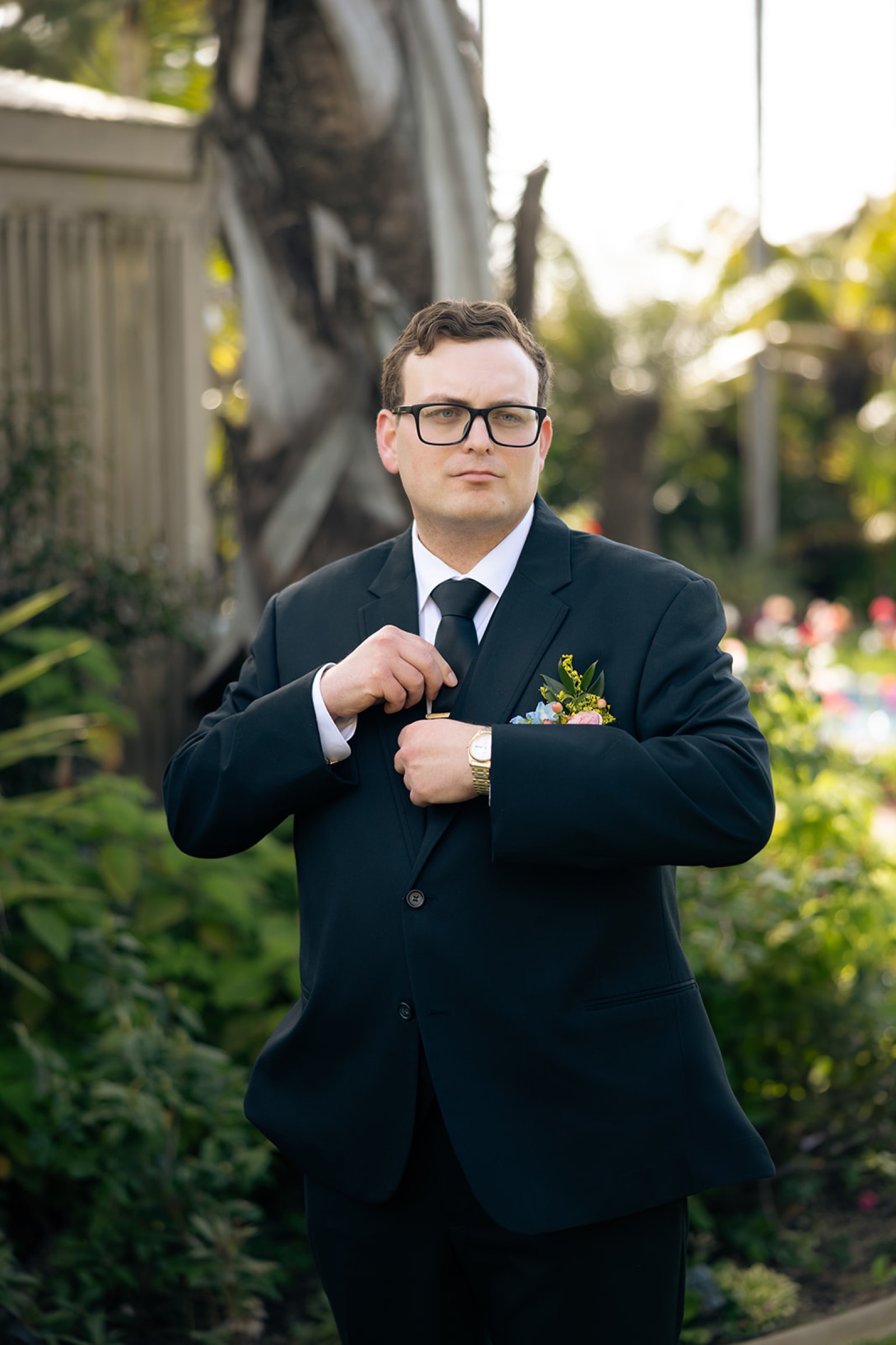 Groom portrait of Ryan at Sherman Library and Gardens