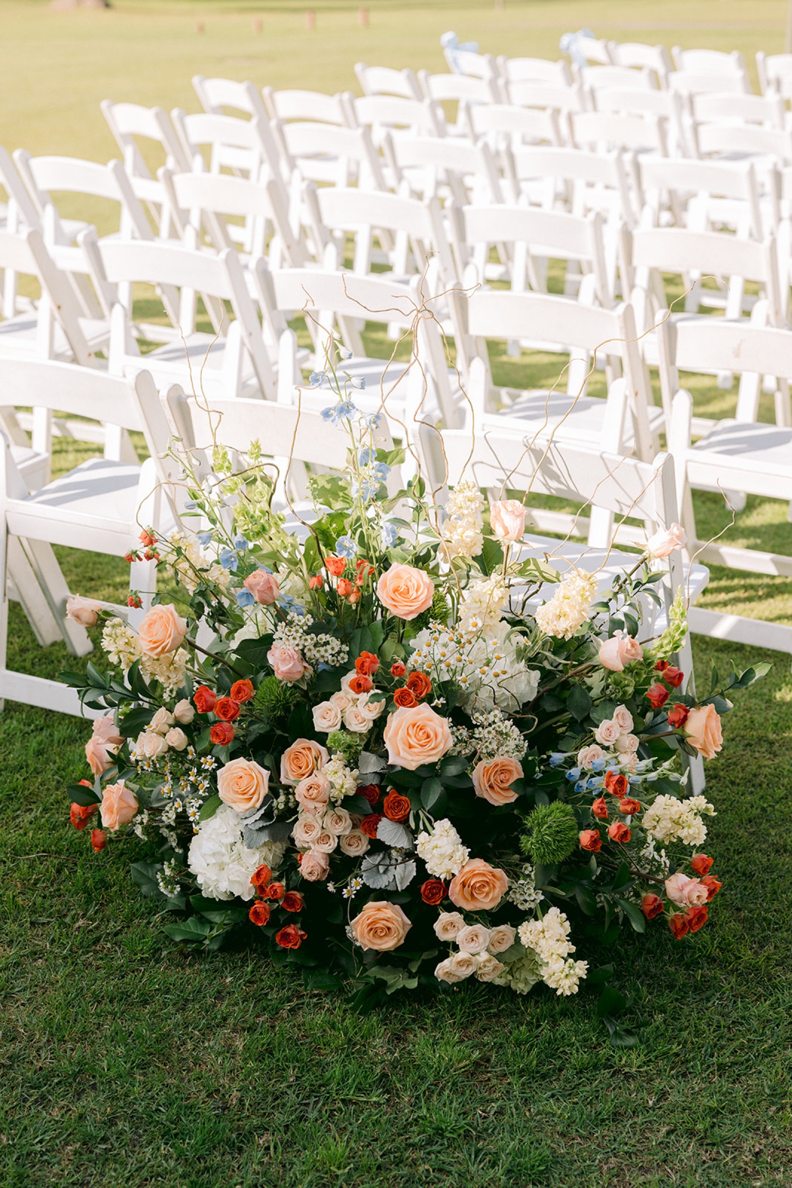 Aisle floral arrangement at South Hills Country Club ceremony