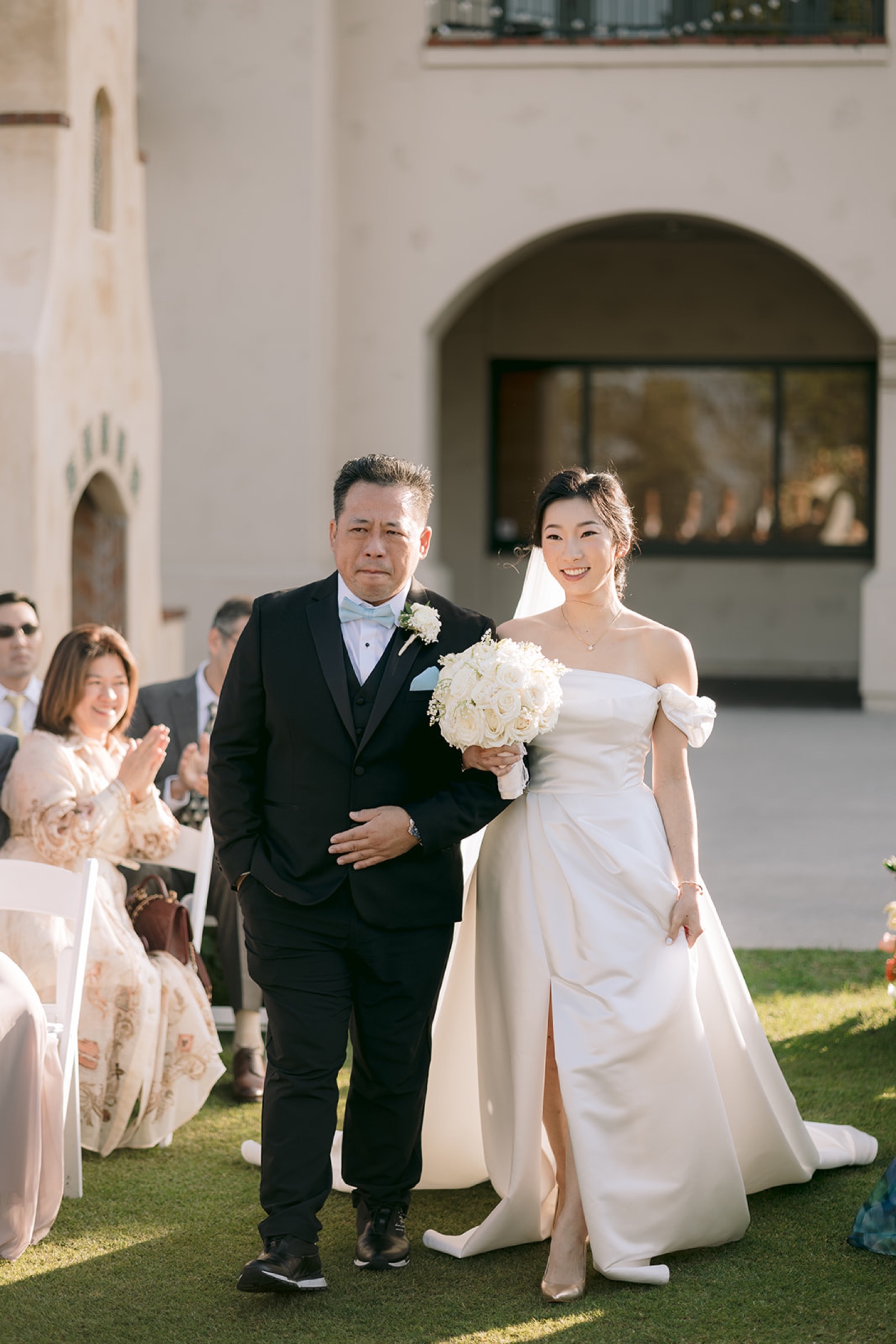 Father walking the bride down the aisle