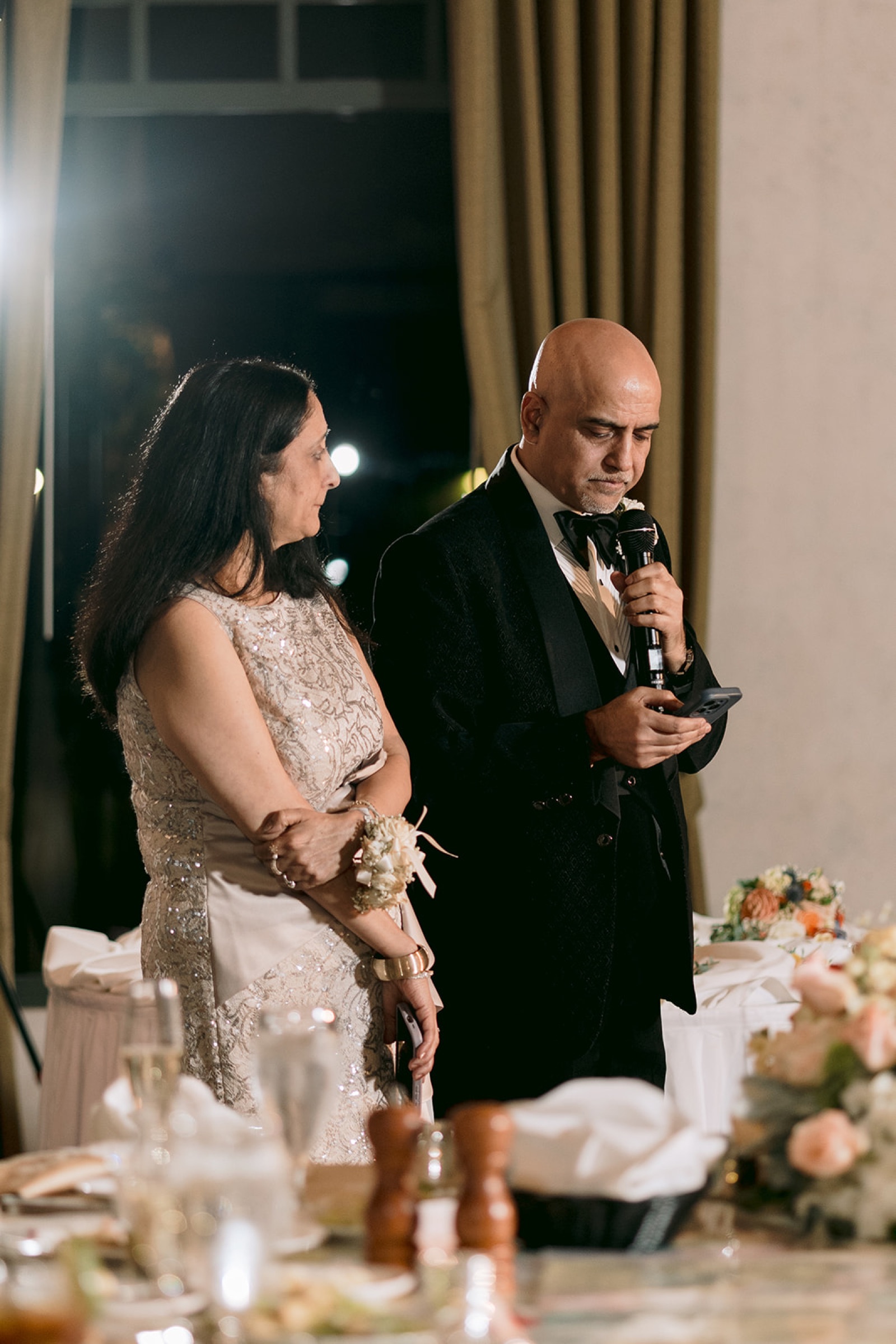 Groom's parents giving a speech