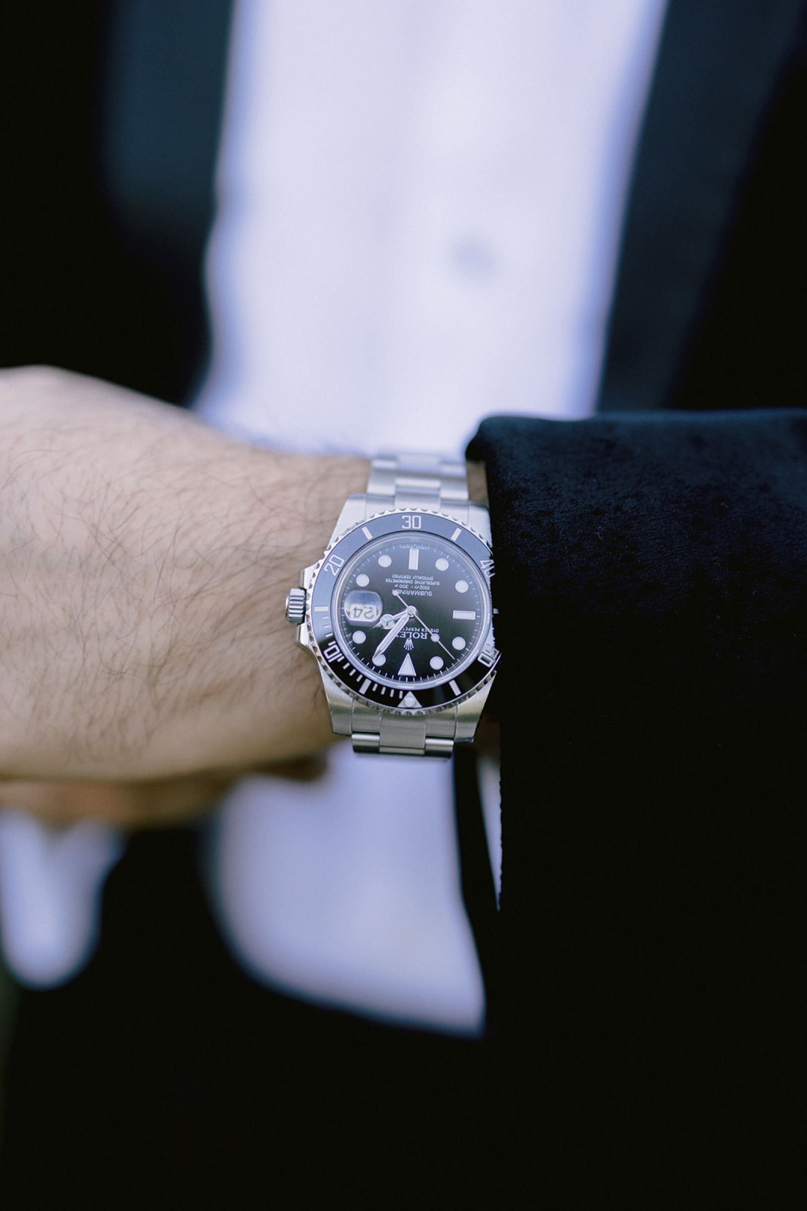 Detail shot of groom's watch