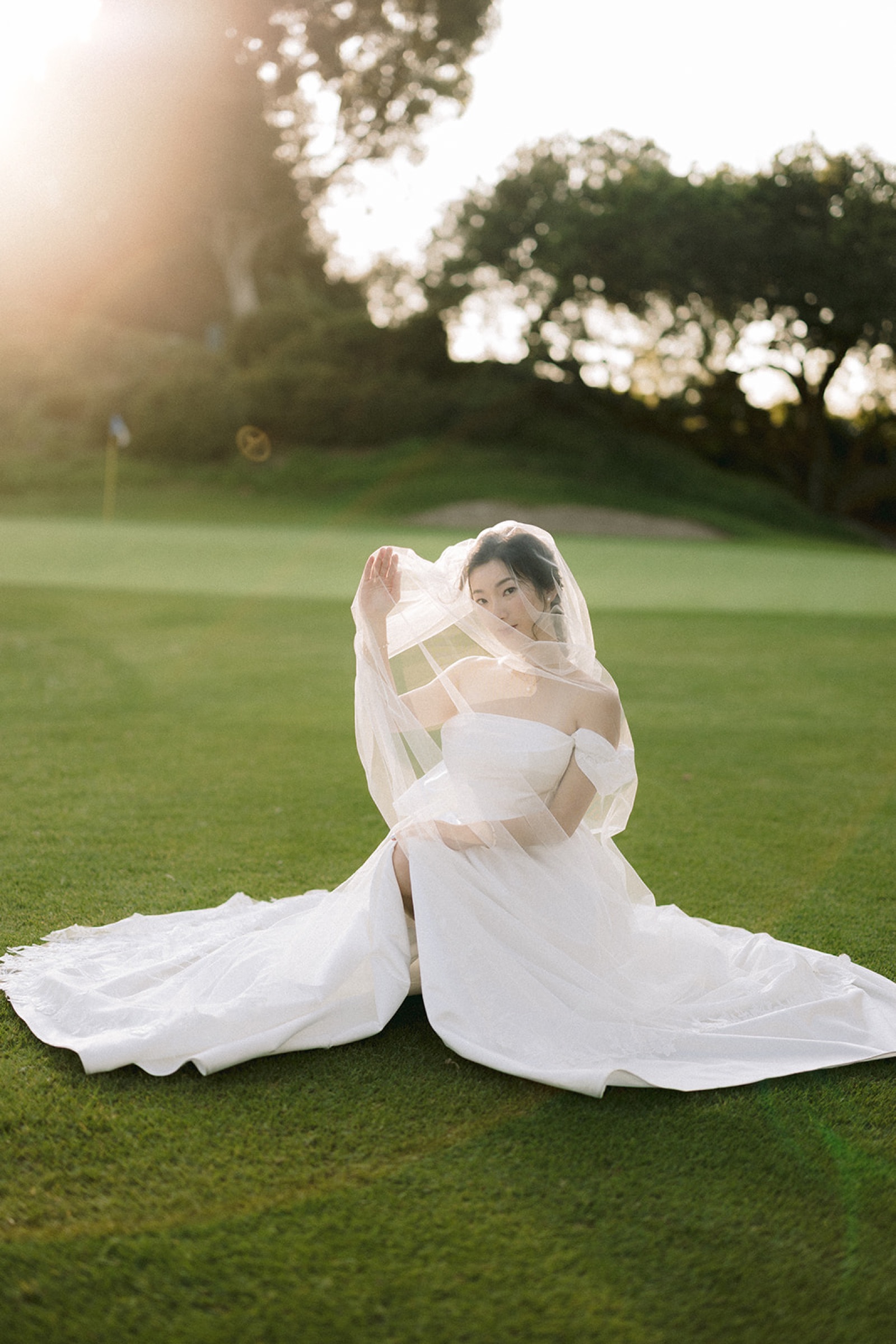 Golden hour lift and kiss on the golf course at South Hills Country Club